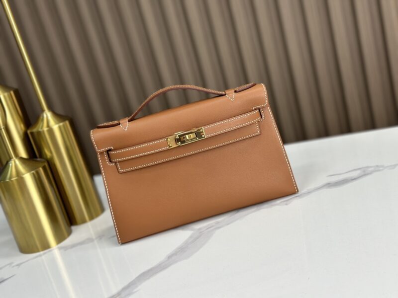 Replica HERMÈS Kelly Pochette in Gold Swift Leather – Timeless Luxury Mini Handbag