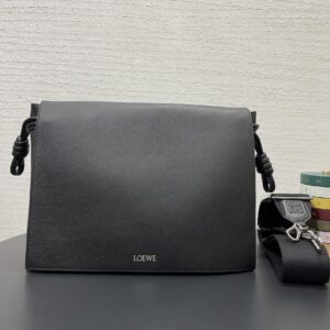 Replica Loewe Flamenco Satchel in Black with premium leather and signature knot detail.