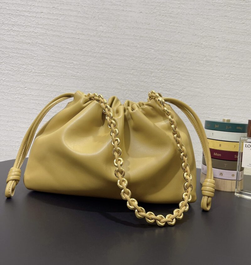 Replica Loewe Medium Flamenco Purse in Sahara with premium leather and signature knot detail.