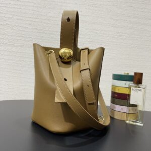 Replica Loewe Mini Pebble Bucket Bag in Oak showcasing premium leather and a minimalist design.