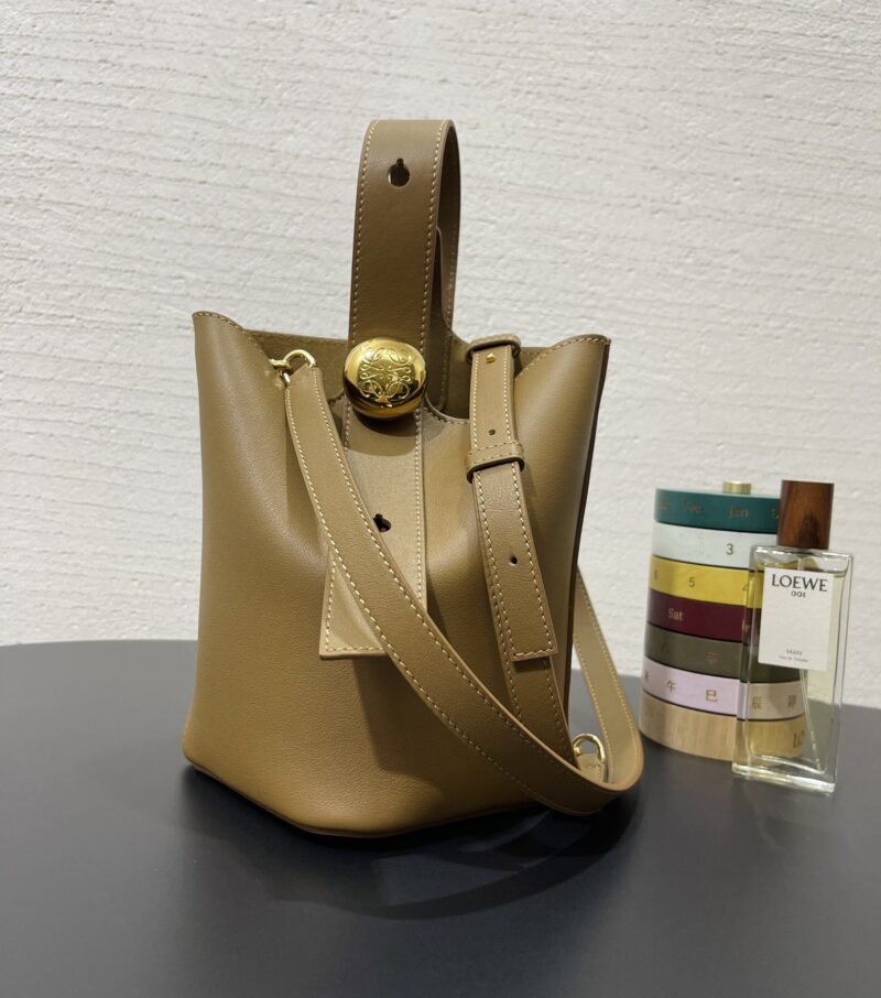 Replica Loewe Mini Pebble Bucket Bag in Oak showcasing premium leather and a minimalist design.