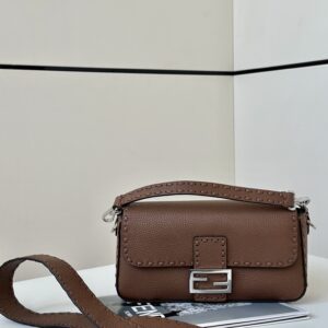 Replica Fendi Baguette Brown Selleria Bag with 612 Hand-Sewn Topstitches, signature FF logo hardware, and luxurious leather finish for a sophisticated and iconic look.