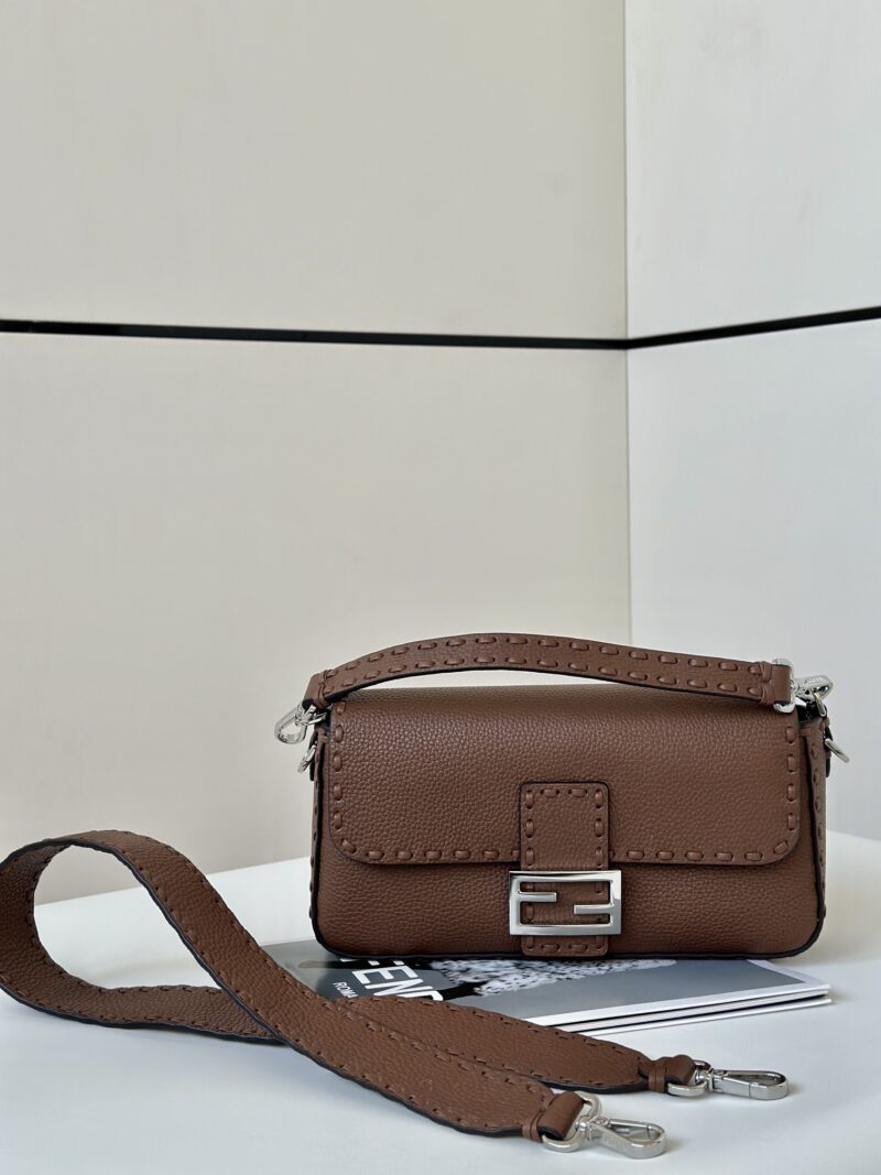 Replica Fendi Baguette Brown Selleria Bag with 612 Hand-Sewn Topstitches, signature FF logo hardware, and luxurious leather finish for a sophisticated and iconic look.